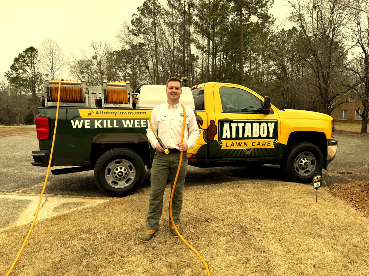 Lawn insect control treatment being prepared by Attaboy Lawn Care technician