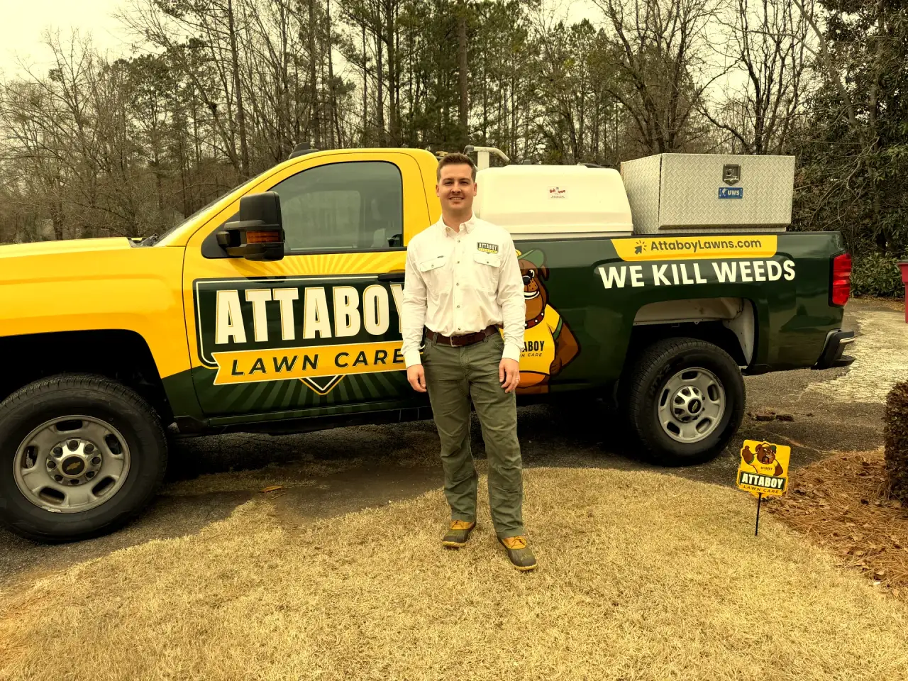 Attaboy Lawn Care branded truck and work environment